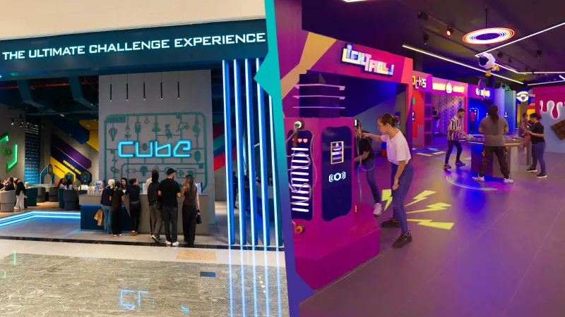 Vista dividida: a un lado la entrada y la recepción de un CUBE en un centro comercial, al otro un espacio Arena abierto con frentes de juego iluminados y jugadores en plena partida